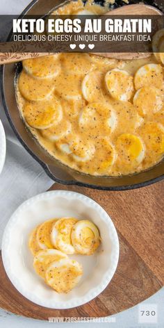 eggs are being cooked in a skillet on a wooden cutting board next to other dishes