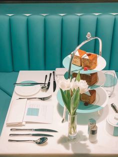 a table with plates and silverware on it