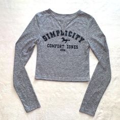 Brand New In Bag, Never Worn, Adorable, Soft, Long Sleeve, Cropped Tee! Size: M / Juniors Color: Heathered Gray, Black Print Approximate Measurements Laying Flat: Armpit To Armpit: 13.5” Sleeve Inseam: 19” Length: 16.5” Smoke Free Home~ Fast Shipping Trendy Gray Top With Text Print, Trendy Gray Tops With Letter Print, Trendy Heather Grey Tops With Letter Print, Trendy Heather Grey Top With Letter Print, Casual Heather Grey Top With Text Print, Fitted Gray Top With Letter Print, Trendy Heather Grey Tops For Streetwear, Trendy Heather Grey Top For Streetwear, Trendy Heather Grey Streetwear Tops