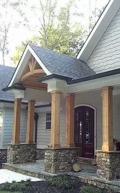 a house with columns on the front porch