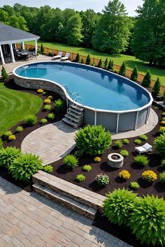 an above ground swimming pool surrounded by landscaping