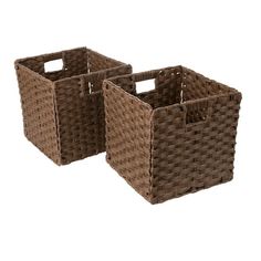 two brown baskets sitting next to each other