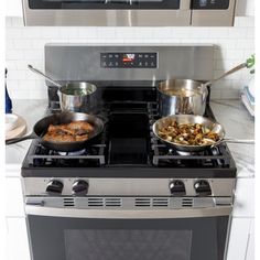 two pots and pans are cooking on the stove top, while another one is in the oven