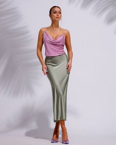 "Classic and trendy silk midi high-waisted skirt. It's elegant and sophisticated, there's nothing to add or remove, simple but at the same time unique. DETAILS - hits at mid-calf - high-waisted - solid color - elastic waistband - bias cut - relaxed fit silk top can be bought from us in the section \"tops\" Material  Silk and polyester blend SIZES Available in 2 sizes: XS-S, M-L XS-S = 2/4 US numeric  WAIST 23-26 inches or 59-67 cm HIPS 33-37 inches or 86-94 cm   M-L = 6/8 US numeric  WAIST 26-29.5 inches or 68-75 cm HIPS 37-41 inches or 94-104cm PAYMENT You can pay for your order with Paypal or using a credit card. Drop me a line, I'll send you an instruction from Etsy how to do it. SHIPPING Standard shipping is free to some countries. If you want to have express shipping, please upgrade w Summer Evening Pencil Skirt, Feminine Summer Formal Pencil Skirt, Summer Satin Skirt For Cocktail Occasions, Satin Cocktail Skirt For Summer, Chic Summer Evening Pencil Skirt, Summer Satin Cocktail Skirt, Summer Cocktail Satin Skirt, Chic Silk Pencil Skirt For Night Out, Chic High-waist Satin Skirt