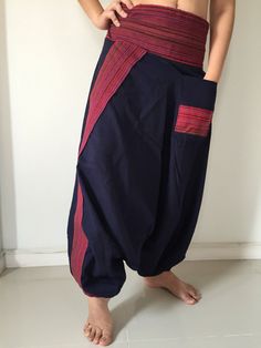 "These super soft rayon baggy unisex harem pants have the \"flow\", perfect of yoga or just a cool strolling. Comfort and character are what these pants are all about. They have the traditional sarong look & feel but a lot more practical when it comes to activity like yoga. As a bonus, they are convertible! Just pull them up and you get yourself a cute jumpsuit in a flash. Together with elastic cuff legs, you can wear them short or long. The pants have smock waist (wide bang elastic) with no Cute Jumpsuit, Yoga Trousers, Navy Jumpsuit, Sarong, Smocking, Harem Pants, Convertible, Flash, Pants For Women