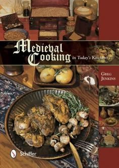 a cookbook with an image of food on the table and in front of it