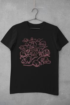 Rats T-shirt Printed on a super soft, cotton tee Dispatched in 5 working days or sooner Unisex Free UK delivery Material: 100% ringspun cotton. Chest (to fit): S 34/36 M 38 L 40/42 XL 44/46 XXL 48/50 ECO-FRIENDLY Each garment is made to order, reducing extra material and energy that would be otherwise wasted We use DTG printing process which is easier on the environment than screen-printing Our ink is bright and also eco-friendly. Do not tumble dry. Wash at 30 degrees c, inside out. Do not iron Funny Rats, Indie Aesthetic, Tumblr Outfits, Aesthetic Shirts, J Fashion, Grunge Aesthetic, Grunge Outfits, Tee Design, Shirt Outfit