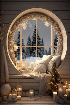 a round window with christmas decorations and candles in front of the snow - covered trees