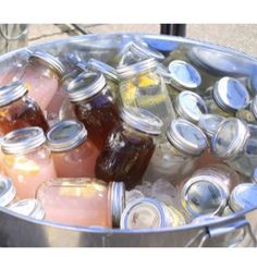 a bucket filled with lots of different kinds of drinks