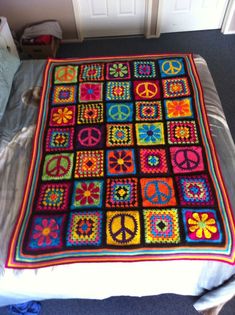 a blanket that has been made to look like a peace sign on top of it