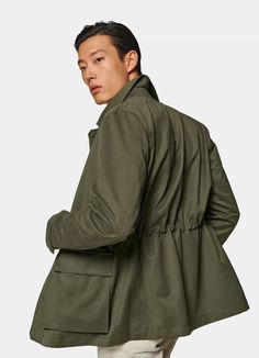 Dark Green Field Jacket in Water-Repellent Technical Fabric | SUITSUPPLY US Military Utility Jacket For Fall, Olive Fall Utility Jacket With Multiple Pockets, Olive Utility Jacket With Multiple Pockets For Fall, Khaki Utility Outerwear With Lapel Collar, Olive Long Sleeve Outerwear With Flap Pockets, Green Fall Parka For Workwear, Khaki Parka For Fall Workwear, Khaki Workwear Parka For Fall, Spring Olive Utility Jacket With Flap Pockets