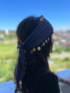 This unique hair bandana, inspired by the mystic beauty of the Black Sea region, is a versatile accessory suitable for various styles and purposes. Firstly, it's perfect for keeping hair tied up or neatly secured. Whether during sports activities or daily routines, it holds hair in place without any hassle. Moreover, it keeps hair away from the face, making it convenient for cooking or applying makeup. However, it's not just practical but also a fashion statement. With its bordo and navy edges and gold lira details, it adds a touch of elegance to any outfit. The design, reflecting the cultural heritage of the Black Sea, brings a distinctive ethnic and traditional flair. Furthermore, the nazar amulet detail adds a special and meaningful touch to this bandana. The nazar amulet is a tradition Bohemian Blue Bandana For Festivals, Afghanistan Scarf, Bohemian Black Bandana, Elegant Blue Bandana, Bohemian Blue Scarf Bandana, Bandana Hairstyles, Sea Inspired, Unique Hairstyles, Black Sea