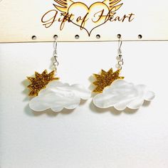 Partly cloudy with sun dangle earrings. The earrings are laser cut from 3mm white pearlescent and gold glitter acrylics. The earrings are fun to wear, they make great conversational pieces as well. Earrings measured 1.1 inches long and 1.5 inches wide, not counting the hooks. They can be made into clip on earrings. Earrings will be placed in a gift box, carefully packed and shipped, perfect as a gift for yourself or a loved one. Any questions? Please feel free to contact me! Please note colors m Partly Cloudy, Glitter Acrylics, Halloween Earrings, Cloudy Day, Wood Earrings, Acrylic Earrings, Scary Halloween, Just Amazing, Gold Glitter