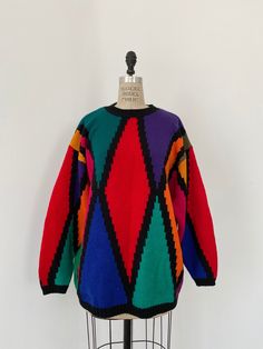 "ITEM DESCRIPTION 80s Vintage, Colorful Knit sweater. Brand : Vintage : Unknown Tag Size : M Color : multi MEASUREMENTS (Measured in inches on a flat surface) Shoulder to shoulder : 23 Chest (armpit to armpit) : 23 Back length : 28.5 \"Good condition.\"" Colorful Knit Sweater, Colorful Knit, Kansai Yamamoto, Bear T Shirt, 80s Vintage, Cool Tees, Flat Surface, Women Pullover, Vintage Black