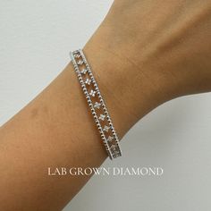 Lab Grown Diamond Bracelet, Beaded Flexible Bangle, Flower Cluster, 14k Solid White. Flexible Diamond Bangle.Beaded and Flower. Loose Fit This bangle is loose fit.  1. 6 inch bangle fits 6-6.25 inch. (6 Inch bangle will take 2-3 weeks to be shipped)  2. 7 inch bangle fits 7-7.25 inch.  This beautiful flexible tennis bangle is perfect for every day wear and can be stacked with other bracelets. Choose your gold color preference. This makes the perfect gift for Graduations, Birthdays, Anniversaries Formal Jubilee Bracelet With Flower Shape, Flower Cluster, Diamond Bangles Bracelet, Christmas Hanukkah, Bracelet Beaded, Diamond Bangle, 3 Weeks, Diamond Shapes, Lab Grown