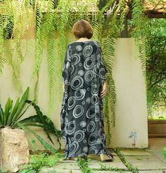 "A soft, comfy, printed light rayon maxi kaftan. A must have piece for this summer. Team this dress with sandal and a big tote to complete a casual chic, or wear it to a garden party, Sunday brunch and beach party. Material: printed light rayon Model is 161 cm. tall with 32\" bust, 28\" waist and 38\" hip Status: ready to ship weight: 315g Measurement: dress (approximately) Width: 43.5\" Bust: 65\" **can fit up to bust max 52\" Hip: 65\" **can fit up to bust max 52\" Length: 52.5\" PLEASE PROVID Casual Rayon Kaftan For Beach, Printed Black Maxi Dress For Beach Season, Printed Rayon Maxi Dress For Beach, Casual Rayon Kaftan For Vacation, Beach Maxi Dress In Printed Rayon, Black Printed Maxi Dress For Vacation, Casual Black Printed Beach Dress, Black Printed Maxi Dress Free Size, Casual Summer Rayon Kaftan