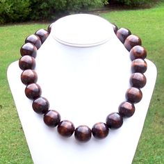 Chunky Wood Necklace Large Wood Necklace Big Wood Bead Necklace Bohemian Necklace Boho Necklace 25mm Round Dark Brown Wood Bead Necklace This modern beauty was hand beaded using large and chunky 25mm round deep brown wooden beads. The necklace measures your choice of 22, 25, 30, or 38 inches long and is securely fastened with a silver clasp. The end result is a chic bohemian piece that fits in perfectly with today's fashion trends! Length can be adjusted if needed - just ask! Check out more fabu Wooden Beads Necklaces For Jewelry Making, Round Wooden Beads Necklaces For Jewelry Making, Bohemian Necklaces With 8mm Beads, Bohemian Necklace With 8mm Round Beads, Brown Wooden Beads Round Jewelry, Brown Wooden Beads Jewelry, Brown Round Wooden Beads Jewelry, Brown Round Beaded Necklace With Large Beads, Brown Beaded Necklace With Large Round Beads