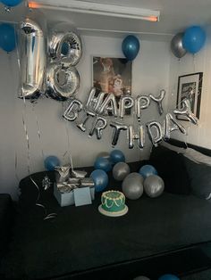 a birthday party with balloons and decorations