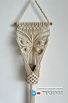 a macrame hanging on the wall