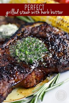 grilled steak with herb butter and corn on the cob for garnish