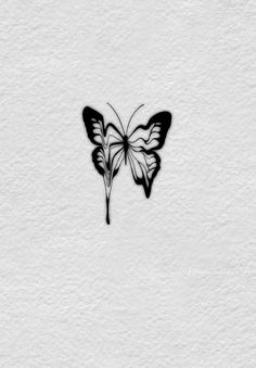 a black and white drawing of a butterfly