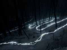 light trails in the snow at night with no one on them or people standing around