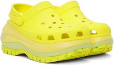 EVA foam rubber slip-on sandals in yellow. · Perforated detailing throughout · Logo-embossed convertible slingback strap · Logo embossed at heel · Molded rubber footbed · Sculptural platform foam rubber midsole · Treaded rubber sole · Logo-engraved hardware · Platform: H3.25 Supplier color: Acidity Yellow Slides With Rubber Sole And Round Toe, Yellow Synthetic Clogs With Rubber Sole, Yellow Slides With Round Toe And Rubber Sole, Yellow Open Toe Clogs With Rubber Sole, Yellow Synthetic Clogs With Round Toe, Yellow Slip-on Slides With Removable Insole, Yellow Rubber Sole Clogs For Spring, Yellow Clogs With Rubber Sole For Spring, Yellow Closed Toe Synthetic Clogs