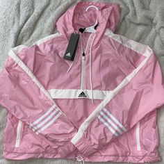 Brand New/Never Work Cropped Quarter Zip Front Pockets Waist Drawstring Pink Sportswear Outerwear For Spring, Adidas Windbreaker With Pockets For Spring, Adidas Spring Windbreaker With Pockets, Adidas Sporty Windbreaker For Spring, Adidas Spring Sportswear Windbreaker, White Adidas Hooded Windbreaker, White Hooded Adidas Windbreaker, White Adidas Windbreaker For Spring, Trendy White Windbreaker With Pockets