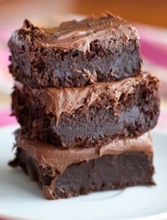 three chocolate brownies stacked on top of each other