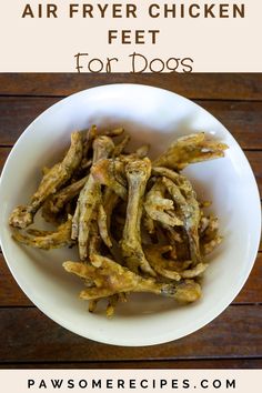 air fryer chicken feet for dogs in a white bowl on a wooden table with text overlay