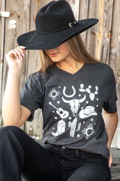 In Texas it doesn't matter where you are from, we can all share a love for some western elements! This dark grey tee features a variety of different western element designs such as a cactus, cowboy boots, a horseshoe and more to really show some southern charm! Western Elements, It Doesnt Matter, Grey Tee, Southern Charm, Doesn't Matter, Western Wear, A Love, Rodeo, Cowboy Boots