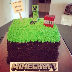 a cake made to look like a minecraft land