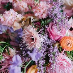 a bunch of flowers that are sitting on a table