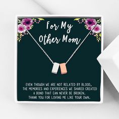 a mother's day card featuring two necklaces with flowers on them and the words, for my other mom