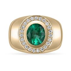 An important Colombian emerald and diamond men's cocktail ring. A large 1.70-carat emerald is bezel set in the very center. The men's ring is made in solid 14K yellow gold and is accented by brilliant round diamonds. This ring has excellent spread and full finger coverage. Smooth and ideal for everyday wear. Setting Style: Cluster Setting Material: 14k Yellow Gold Weight: 8.1 Grams Main Stone: Emerald Shape: Oval Weight:1.70-Carat Clarity: Medium Color: Rich Green Luster: Excellent-Very Good Tre Mens Emerald Rings, Emerald Necklace Pendant, Mens Rings Fashion, Emerald Pendant, Men's Jewelry Rings, Gemstone Necklace Pendant, Natural Emerald, Oval Diamond, Emerald Diamond