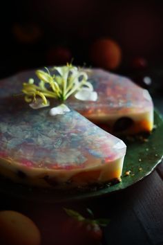 two pieces of cake sitting on top of a green plate