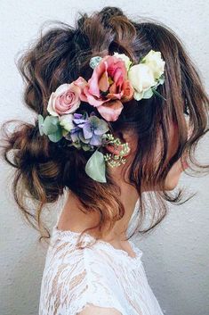 a woman with flowers in her hair