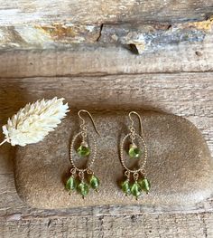 Gold filled dangle earrings with faceted peridot gemstones Petite Earrings, Handmade Dangle Earrings, Earrings Handmade Dangle, Gold Dangle Earrings, Peridot Gemstone, Garnet Gemstone, Gold Earrings Dangle, Etsy Earrings Dangle, Earrings Photo