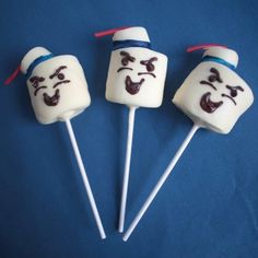 three marshmallows with faces on them