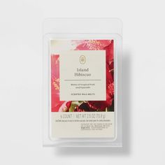 a packaged package of red flowers on a white background with the label for island botanicals