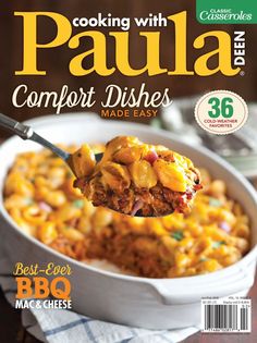 the cover of cooking with paula comfort dishes made easy, featuring a spoon full of macaroni and cheese