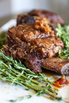 a close up of a plate of food with meat