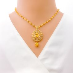 Ganesha Polki Necklace Set - a magnificent piece crafted from 22k Yellow Gold, weighing 27.7 grams, adorned with 6.03 ct of premium uncut diamonds. This exquisite set comes with matching earrings, showcasing the intricate details and beautiful design of this high-fashion statement piece. Lock in your style with the hook lock, and elevate any outfit with this breathtaking set. PRODUCT DETAILS Gold Purity(karat): 22k Item Weight(grams): 27.7 Item Finish: Yellow Gold Stone: Uncut Diamond (Polki) Di Elegant 22k Gold Temple Necklace For Puja, 22k Gold Kundan Necklace For Diwali And Formal Occasions, Formal Yellow Gold Kundan Necklace For Diwali, Gold Diamond Chandbali Jewelry Sets, 22k Yellow Gold Jewelry Sets For Puja, Elegant Hand Set Temple Necklace For Puja, Gold Diamond Bridal Necklace For Ceremonial Occasion, Formal Yellow Gold Chandbali Temple Necklace, Gold Diamond Chandbali Necklaces