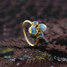 Natural Raw Aquamarine Gemstone Vintage Ring \ Womens Ring \ Dainty Ring \ Delicate Ring \ Birthstone Ring \ Minimalist Jewelry \ Boho Rings Stone Size: 7 x 8 mm Weight: 2.73 Gram Material: Copper Polish: All Polish Available . Contact us for wholesale prices. R I N G S https://www.etsy.com/in-en/shop/GemFormingStudio?section_id=22783374 B E A D S https://www.etsy.com/in-en/shop/GemFormingStudio?section_id=22828835 W A N D S https://www.etsy.com/in-en/shop/GemFormingStudio?section_id=22997040 C Minimalist Crystal Ring With Natural Stones For Promise, Minimalist Natural Stones Crystal Promise Ring, Minimalist Rings With Natural Stones, Minimalist Natural Stone Rings As Gifts, Minimalist Natural Stone Rings Gift, Minimalist Crystal Ring With Natural Stones As Gift, Minimalist Crystal Ring With Natural Stones For Gift, Blue Wedding Rings With Natural Stones, Wedding Blue Rings With Natural Stones