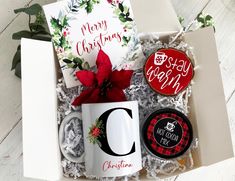 a christmas gift box with coffee, cookies and candy