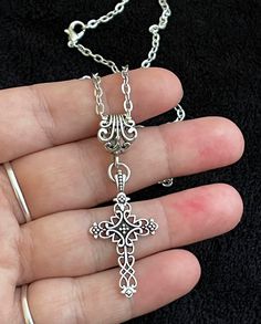 strong 18 inch link chain, lobster clasp tested. Beautiful Hand made Victorian style Cross pendant necklace with - short 18 inch chain. LEAD FREE AND NICKLE FREE.  You will Receive- 1x Cross pendant necklace on 18 inch chain (as pictured) gift bagged  Silvery alloy Cross pendant Material: zinc alloy Main colour: plated antique silver (as pictured)  Cross pendant size including bail approx: 50mm x 20mm   UK seller UK 2nd class P&P FREE    NOTE** I also have other themed Necklaces available in my other items :) SO please Check out my other items!   I am a honest seller, I hand make most of my items and am very proud with the quality of the items I sell, all my items are Fast dispatch usually within 24hours, instant payment via paypal is required, I always give positive feedback immediately o Adjustable Cross Necklace With Lobster Clasp, Spiritual Cross Necklace With Lobster Clasp, Adjustable Cross Chain Necklace, Metal Cross Necklace With Adjustable Chain, Adjustable Chain Metal Cross Necklace, Gift Cross Necklace With Crucifix Chain, Gift Crucifix Cross Necklace With Chain, Sterling Silver Cross Chain Necklace With Adjustable Chain, Adjustable Cross Chain Jewelry