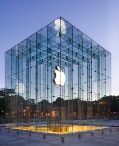 an apple store with glass cubes in the middle