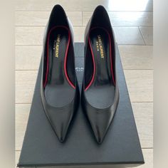 Brand New Black Saint Laurent Mid Heel Tripon Pumps. Size 36.5. Heel Height 2 1/4” Elegant Black Court Shoes With Leather Sole, Black Leather Sole Court Shoes For Evening, Designer Court Shoes With Contrasting Heel, Formal Black Court Shoes With Branded Insole, Luxury Black Court Shoes For Work, Designer Black Court Shoes With Leather Sole, Designer Black Leather Court Shoes, Designer Black Court Shoes With Sculpted Heel, Designer Black Court Shoes With 4-inch Heel