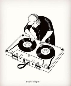 a man that is playing some kind of music on a turntable with headphones