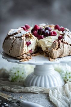 a cake that has been cut into pieces and is on a plate with the rest of it